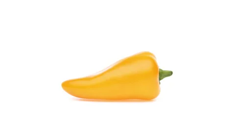 One yellow sweet pepper is rotating on white background. Video stock 159158105