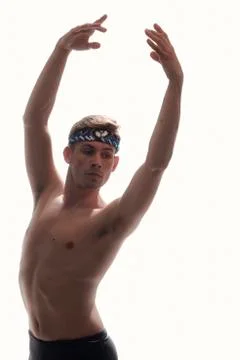 One young ballet dancer, upper body shot, arms raised, posing shirtless, phot Stock Photos
