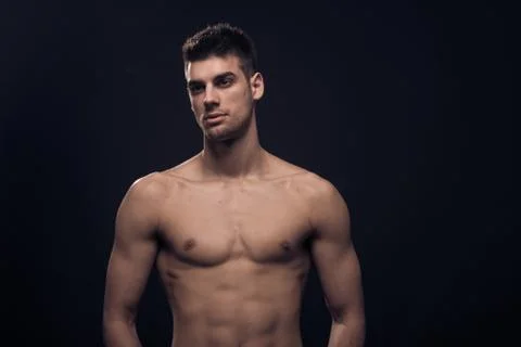 One young man, looking sideways, reflectors shirtless body Stock Photos