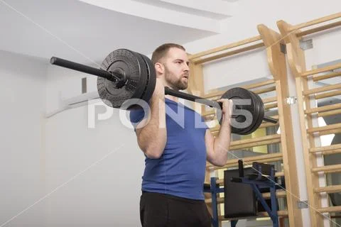 One young man only, Weight Bar, fitness Stock Photos