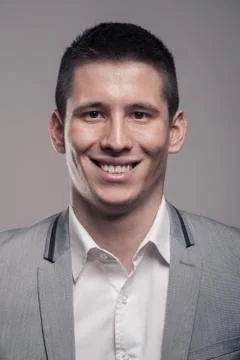 One young man, upper body, formal clothes, head face headshot smiling Stock Photos