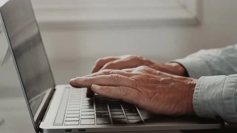 One young man working at home in the office with laptop and notebook taking note Stock Footage 152111337