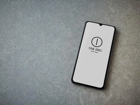 One Zero app launch screen on smartphone on ceramic stone background Stock Photos