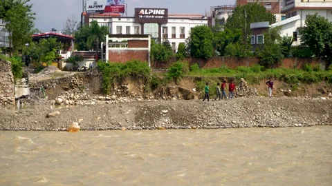 Ongoing construction amid heavy flood in India Stock Footage 321039625