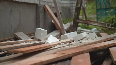 The ongoing process of Construction Debris and Dust in Motion is a visually 動画素材 314572055