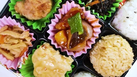 Onigiri bento close up rotating Video stock 316505911