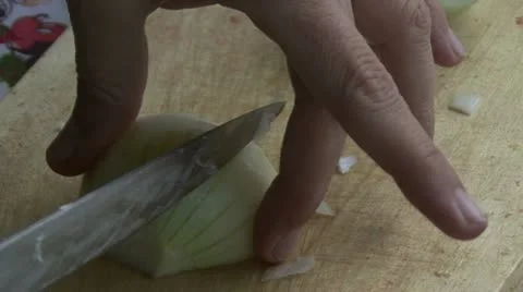 Onion and kitchen knife Video stock 12449771