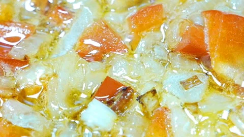 Onion and pepper are fried in vegetable oil Stock Footage 104811880