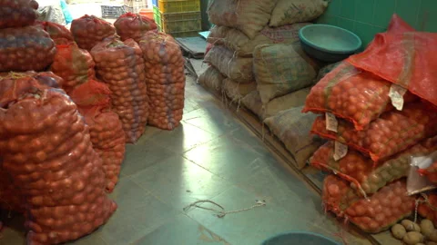 Onion and Potato Sack Packaging in Vegetable Market, Mumbai city, India Stock Footage 319006087