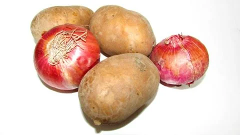 Onion and potato together on white background Stock Photos