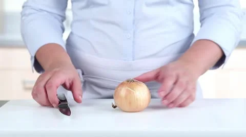 An onion being peeled Stock Footage 24671134