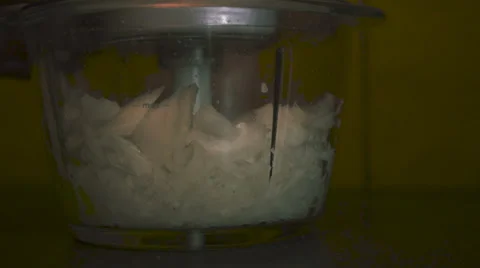 The onion in the blender Stock Footage 67981135