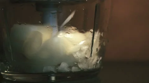 The onion in the blender Stock Footage 67982087