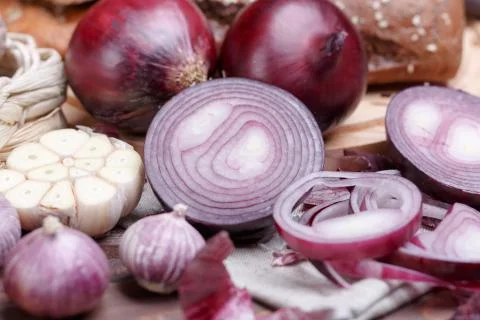 Onion, bread and garlic Stock Photos