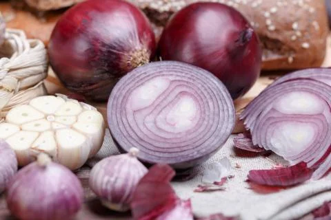Onion, bread and garlic Stock Photos