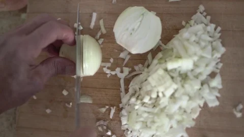 Onion chopping pov Stock Footage 83602535