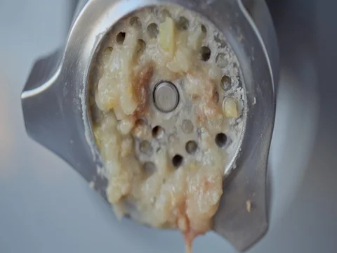 Onion comes out of the grinder Stock Footage 73976098