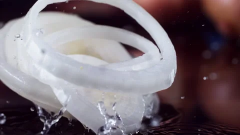 Onion Falling in Super Slow Motion (1000fps)" Description: "Witness the mesmeriz 스톡 동영상 253297811