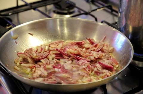 Onion fried in a pan 스톡 사진