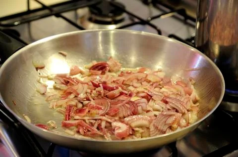 Onion fried in a pan 스톡 사진