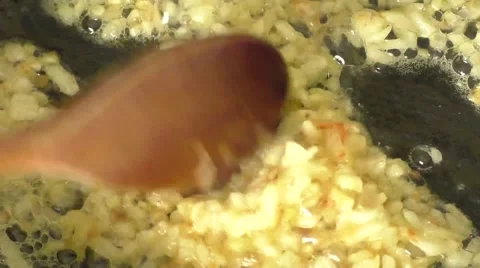 Onion frying in a pan 스톡 동영상 55596433