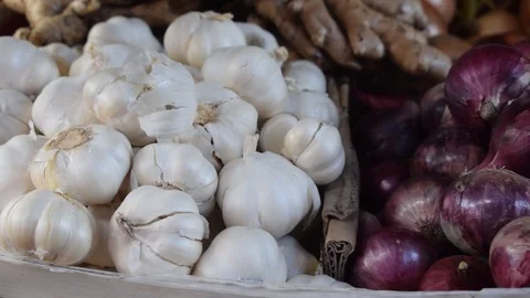 Onion, Garlic and Ginger on display at the fresh market Stock Footage 101837618