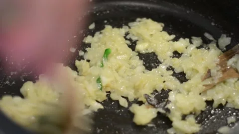 Onion, Ginger, Garlic, Sauteed Stock Footage 136059447