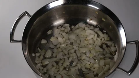 Onion in pan Stock Footage 254727989