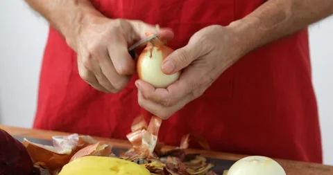 Onion peeled skin using peeling knife Stock Footage 147510969