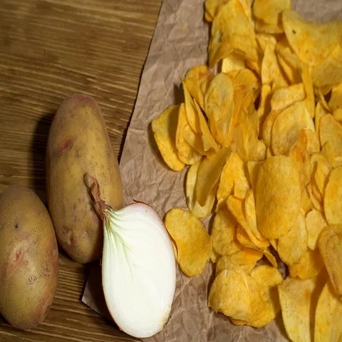 Onion potato chips dolly Stock Footage 69343057