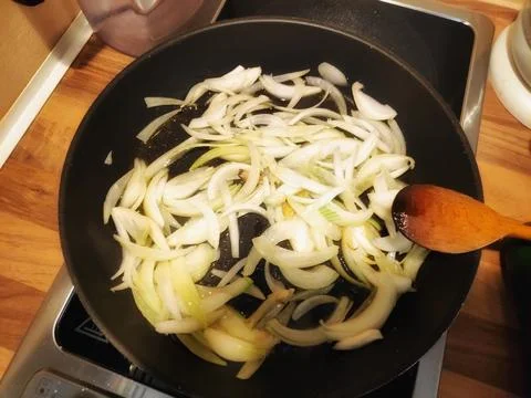 Onion Preparation in Kitchen 写真素材