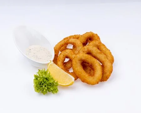 Onion ring. Deep fried onion rings. Breaded crispy vegetable. Snack for beer or Stock Photos