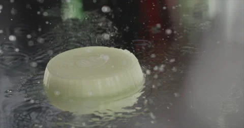 Onion ring fall on a mirror surface Stock Footage 200868824