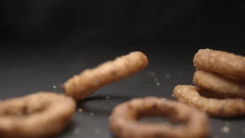 Onion rings close up slow motion studio, tasty fast food Stock Footage 144801200