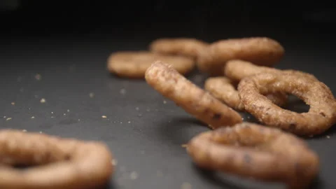 Onion rings close up slow motion studio, tasty fast food Видео 144801295