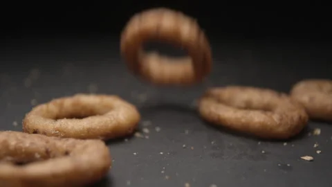 Onion rings close up slow motion studio, tasty fast food Stock Footage 144801321