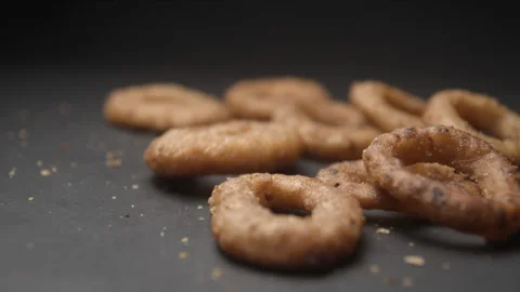 Onion rings close up slow motion studio, tasty fast food Stock Footage 144801396