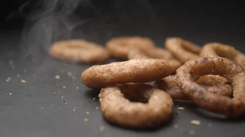Onion rings close up slow motion studio, tasty fast food Vidéo 144801526