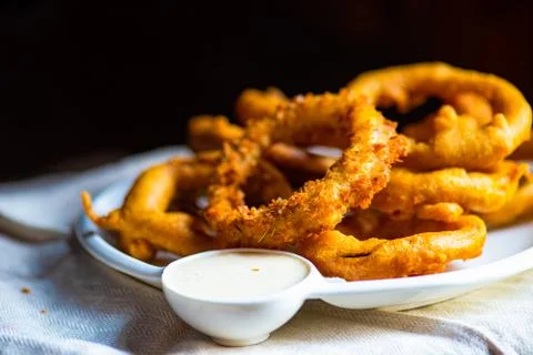Onion rings on a table Stock-Fotos