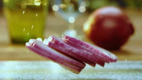 Onion Sliced Drops onto Cutting Board GT0284ss Stock Footage 122052885