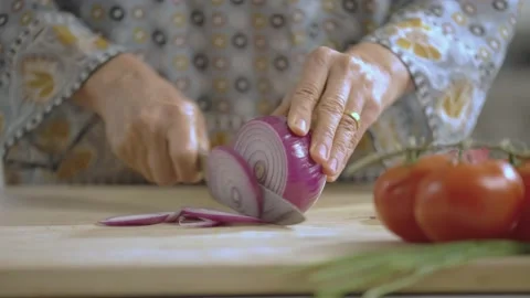Onion sliced by Knife Stock Footage 169535200