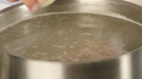 Onions and spices being added to meat stock 스톡 동영상 24658153
