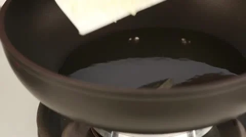 Onions being fried in a pan Stock Footage 24671859