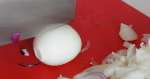 Onions chopped on cutting board, close-up Stock Footage 121309319