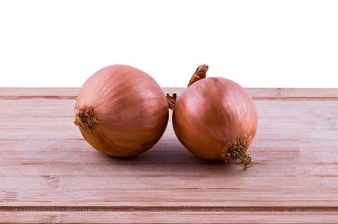 Onions on chopping board front view 写真素材