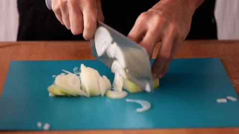 Onions chopping, slow motion Stock Footage 97494650