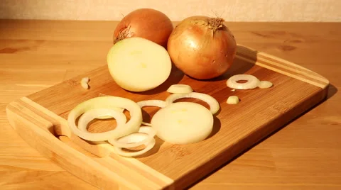 Onions on a cutting board Stock Footage 50362378