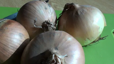 Onions on the desk Stock Footage 36095067