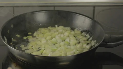 Onions frying Stock Footage 32356627