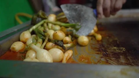 Onions on the grill Stock Footage 295390262